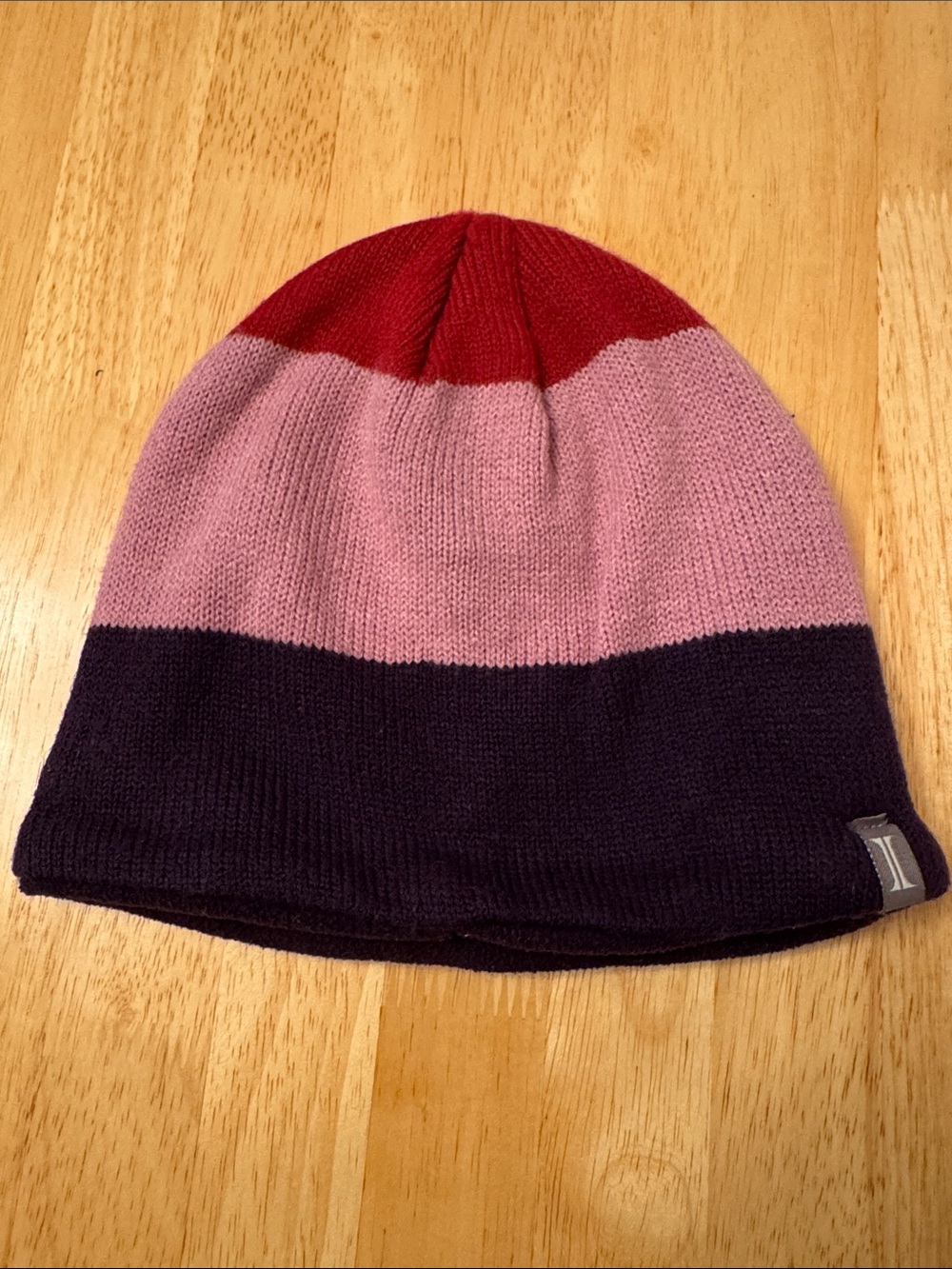 Hurley Three-Tone Knit Beanie in Red, Pink, and Black